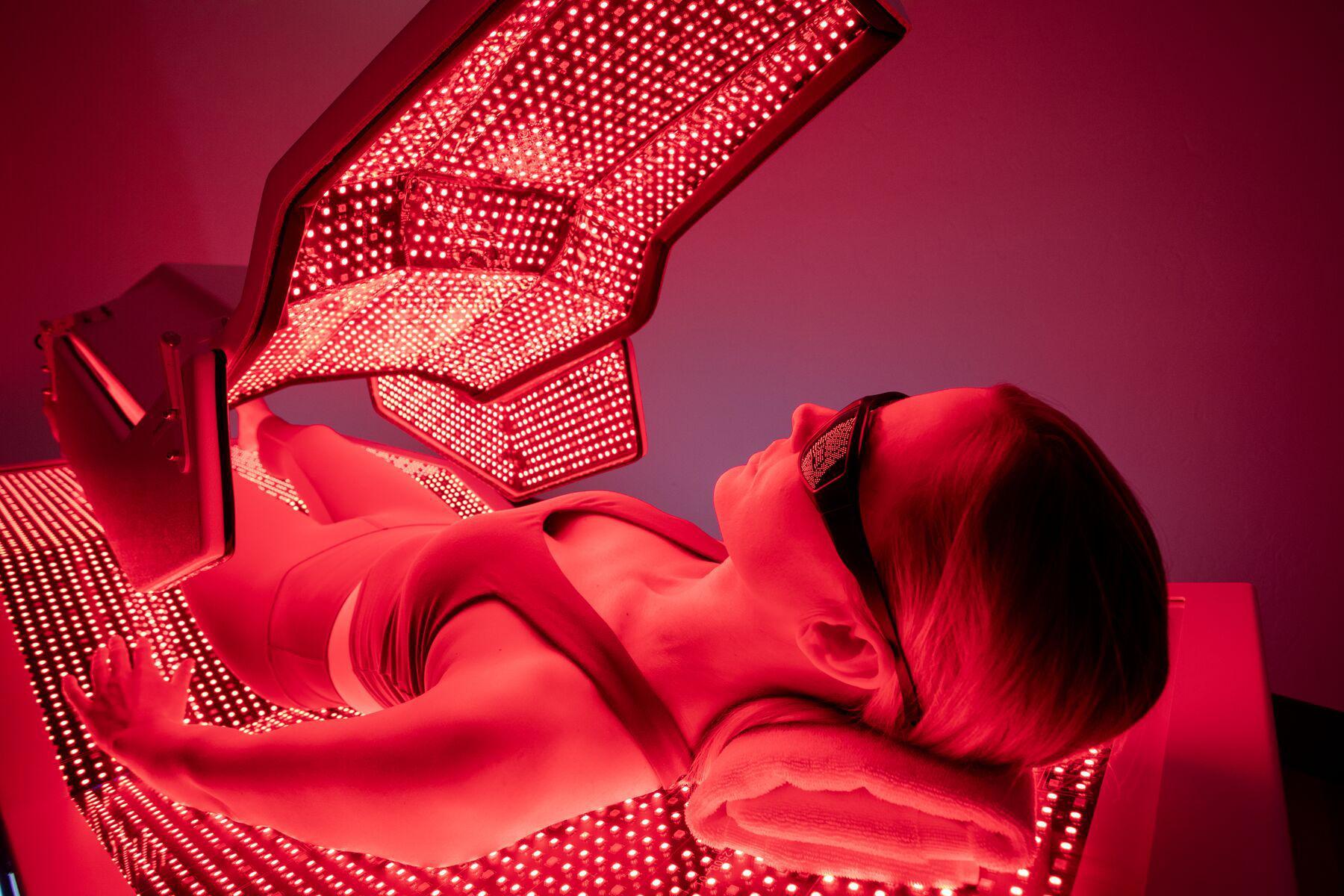 Tropical Tan salon with red light therapy equipment
